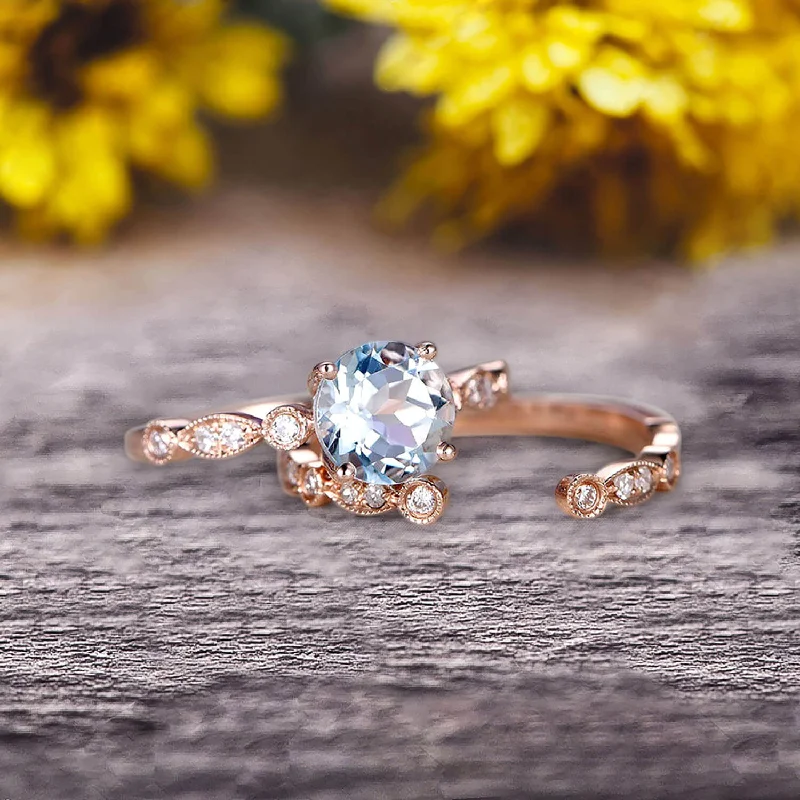 luxury gemstone engagement rings -Vintage Looking 10k Rose Gold 1.50 Carat Round Cut Aquamarine Engagement Rings With Unique Matching Wedding Band Art Deco