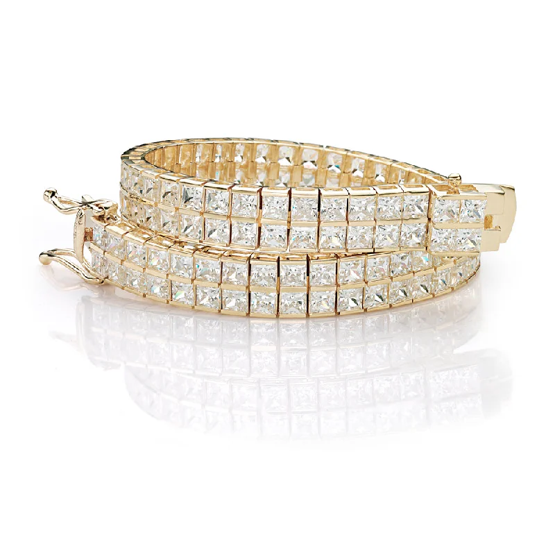 classy bangles for women -Princess Cut tennis bracelet with 22.68 carats* of diamond simulants in 10 carat yellow gold