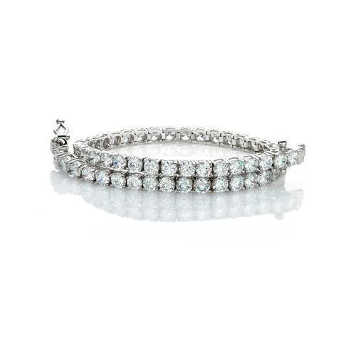 luxurious bangles for women -Round Brilliant tennis bracelet with 6.93 carats* of diamond simulants in 10 carat white gold