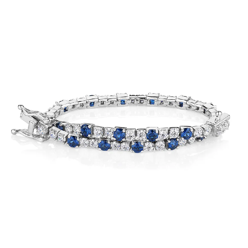 women’s pearl bracelets -Round Brilliant tennis bracelet with sapphire simulants and 3.28 carats* of diamond simulants in sterling silver