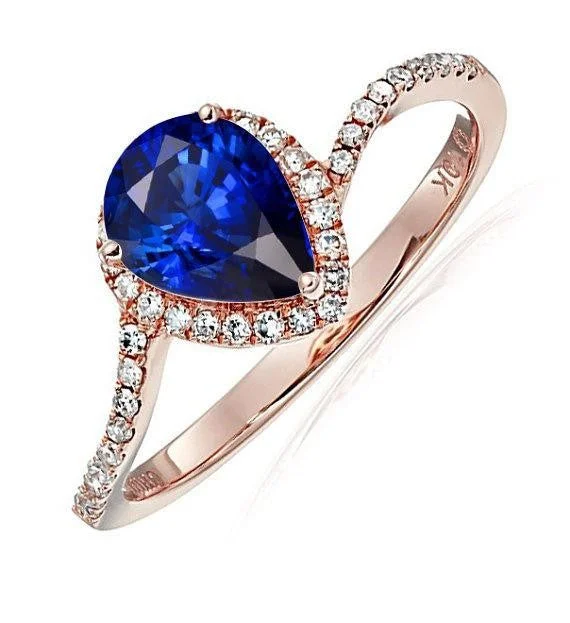 emerald cut engagement rings for women -1.25 Carat Blue Sapphire Engagement Ring in 10k Rose Gold for her