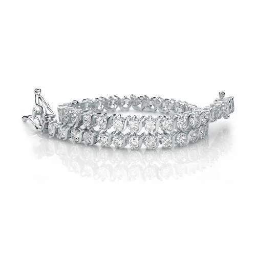 custom bangle designs for women -Round Brilliant tennis bracelet with 5.94 carats* of diamond simulants in 10 carat white gold