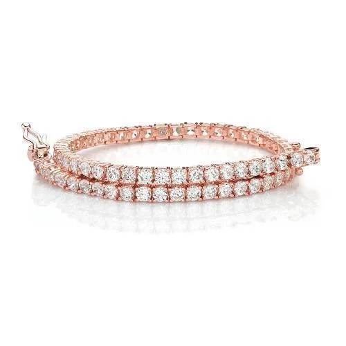 thin bangle bracelets for women -Round Brilliant tennis bracelet with 4.38 carats* of diamond simulants in 10 carat rose gold