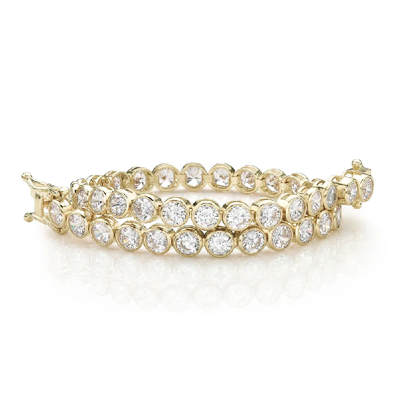 women’s charm bangle bracelets -Round Brilliant tennis bracelet with 9.25 carats* of diamond simulants in 10 carat yellow gold