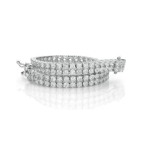 trendy cuff bracelets for women -Round Brilliant tennis bracelet with 13.86 carats* of diamond simulants in 10 carat white gold