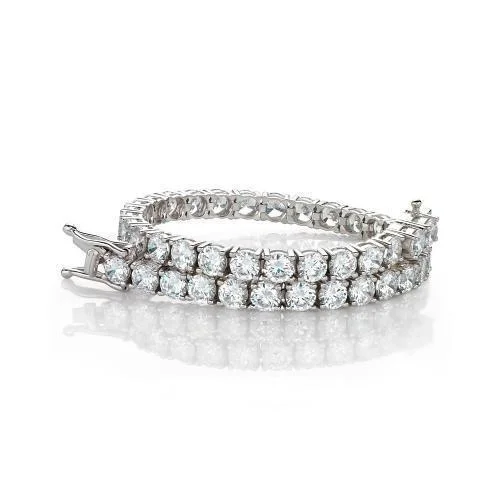 stylish charm bracelets for women -Round Brilliant tennis bracelet with 12 carats* of diamond simulants in 10 carat white gold