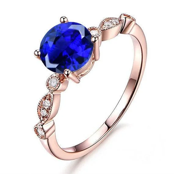 round cut engagement rings for women -1.25 Carat Blue Sapphire and Moissanite Diamond Engagement Ring in 10k Rose Gold