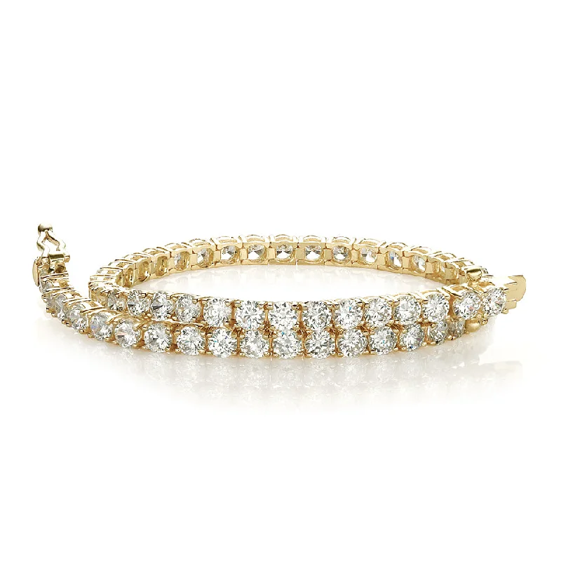 women’s friendship charm bracelets -Round Brilliant tennis bracelet with 6.27 carats* of diamond simulants in 10 carat yellow gold