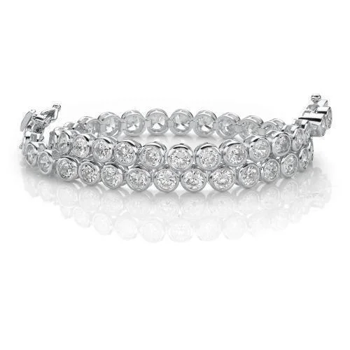 dainty bangles for women -Round Brilliant tennis bracelet with 5.83 carats* of diamond simulants in 10 carat white gold