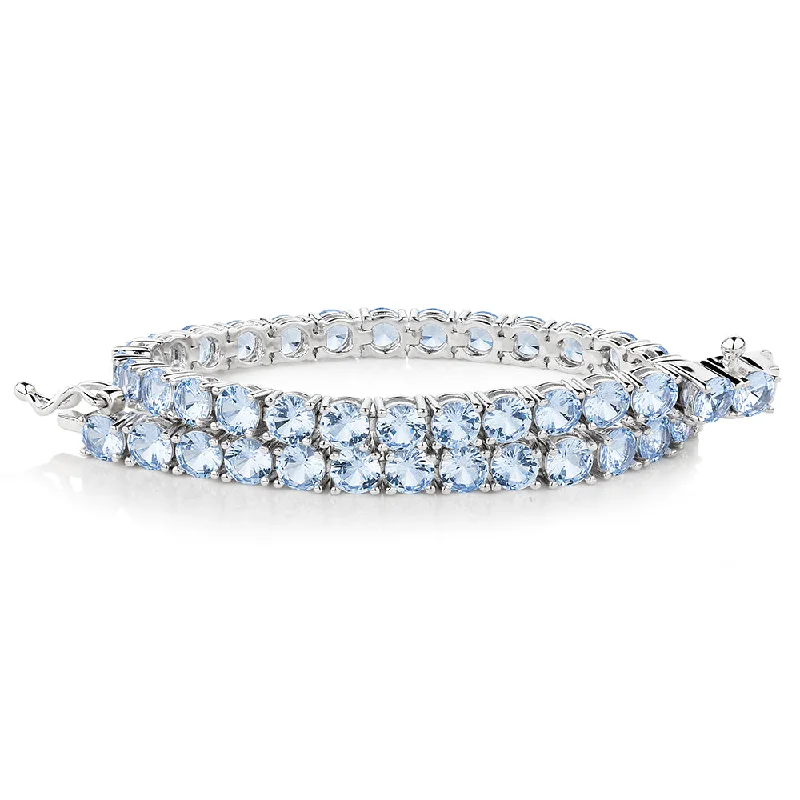 thin bangle bracelets for women -Round Brilliant tennis bracelet with aquamarine simulants in sterling silver