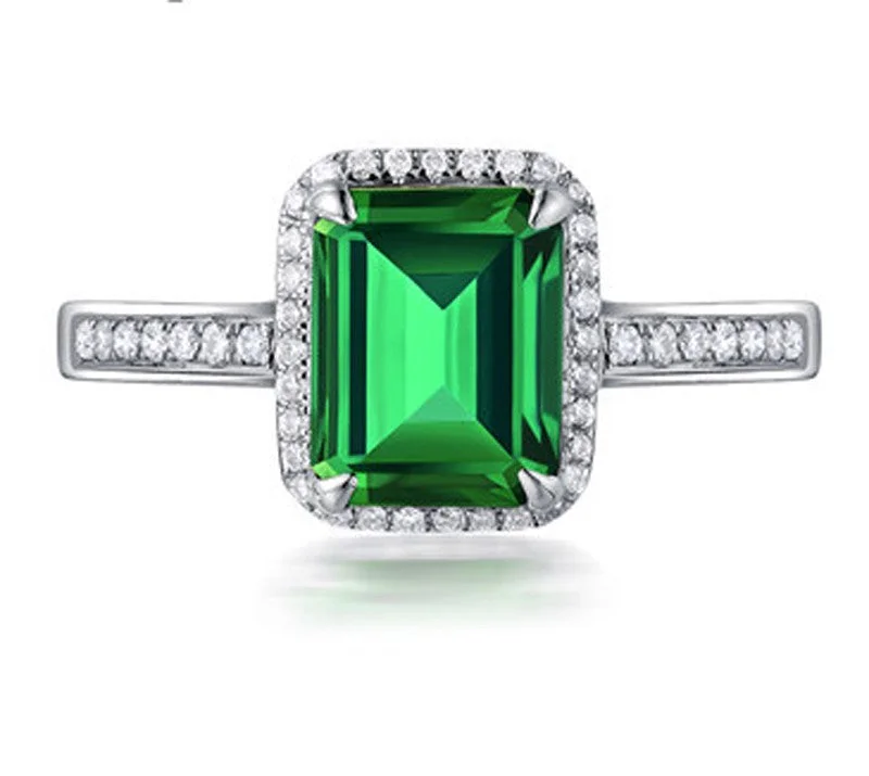 vintage inspired diamond engagement rings -1.50 Carat Emerald Cut Green Emerald and Moissanite Diamond Halo Engagement Ring in White Gold