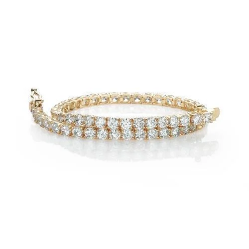 women’s cuff bangles -Round Brilliant tennis bracelet with 6.93 carats* of diamond simulants in 10 carat yellow gold