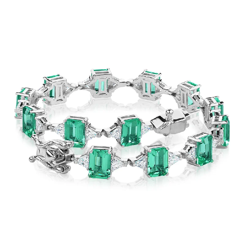 women’s cuff bangles -Emerald Cut and Trilliant tennis bracelet with ocean green simulants and 3.12 carats* of diamond simulants in sterling silver