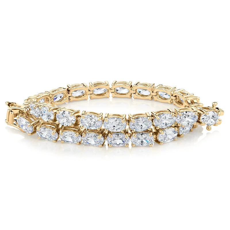 stacking bangle bracelets for women -Oval tennis bracelet with 12.04 carats* of diamond simulants in 10 carat yellow gold